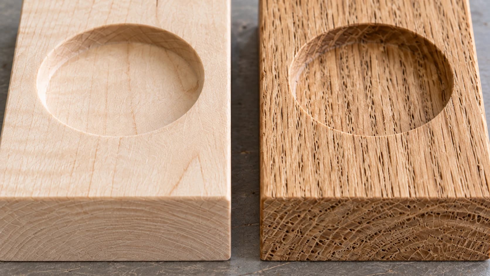 Fine maple grain beside open oak pores near routed recesses